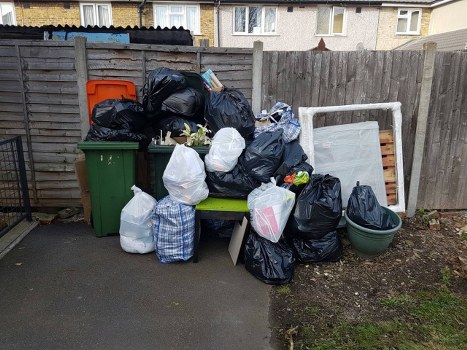 Team of rubbish removal professionals at work in Finchley
